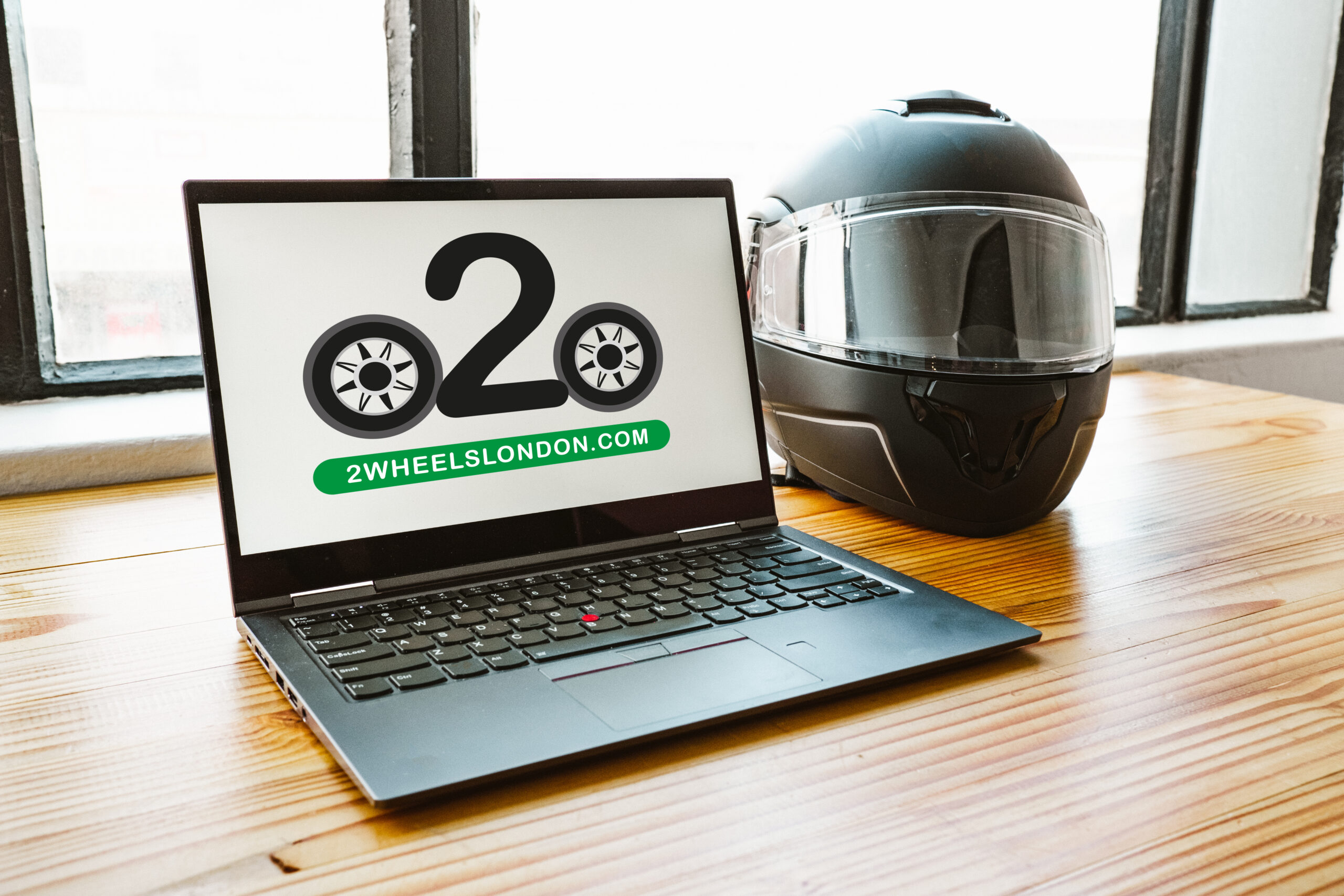 laptop and motorbike helmet